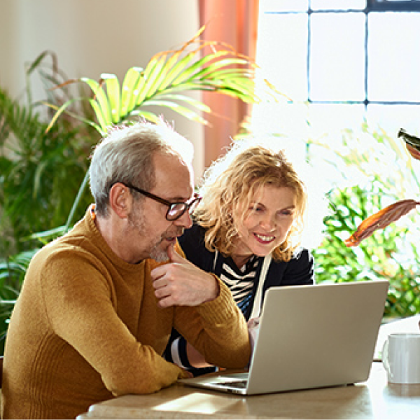 couple looking at laptop computer