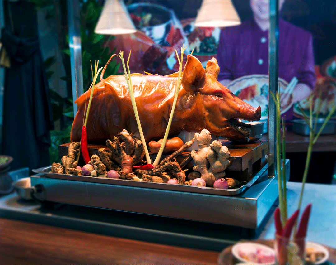 Enjoy babi guling (roasted suckling pig) in Pak Malen
