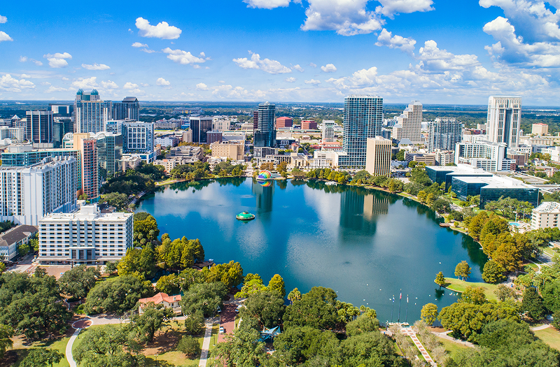 Aerial drone view of Lake Eola and downtown Orlando in the afternoon.