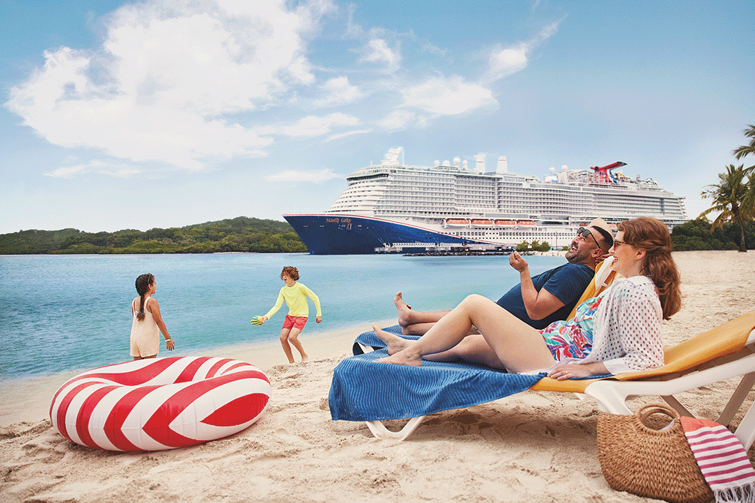 A family enjoying a sunny beach day while a cruiseline sits at the dock in the background.