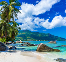 A beautiful beach view with mountains in the distance