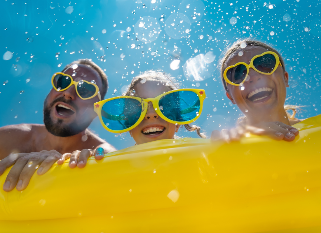 Family in yellow swimming tube