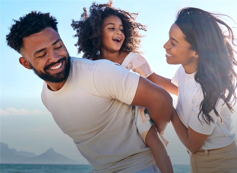 Shell Vacation Club Gift of Vacation happy family playing by the ocean