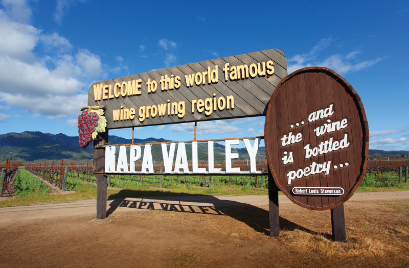 Welcome sign to Napa Valley, California that says "... and the wine is bottled poetry..."