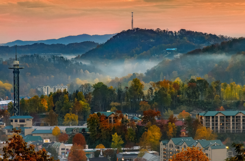 A hazy view of Gatlinburg and the Smoky Mountains in the early evening hours.