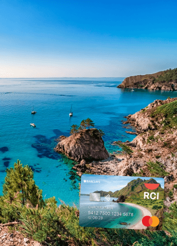 The RCI Barclays credit card juxtaposed in front of a scenic coastal view featuring rocky cliffs, bright blue waters and sailboats scattered about.