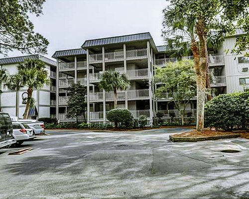 Resort exterior with multiple bedroom units.