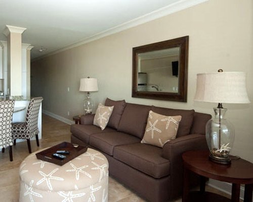 A living room with double pull out sofa.
