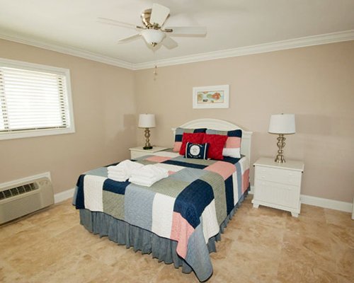 A spacious bedroom with a double bed.