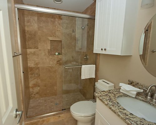 A bathroom with stand-up shower.