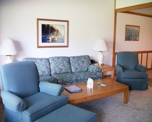 A living room with double pull out sofa.