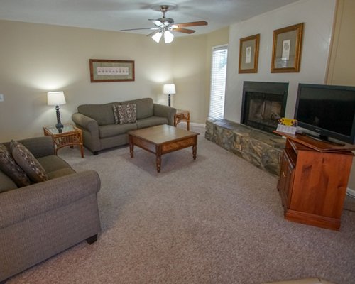 A furnished living room with television.