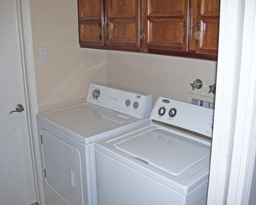 Utility room with washer and dryer.