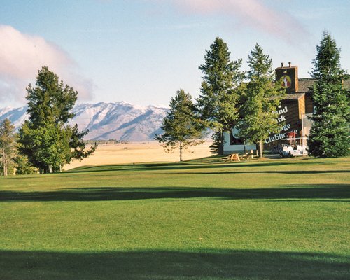 The Timbers Condominiums Resort alongside mountains.