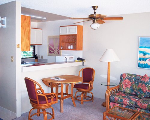 Living room with open plan kitchen and dining area.