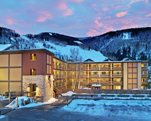 View of The Wren resort at dusk in the midst of winter.