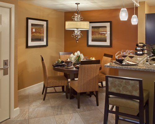 A kitchenette with a dining table.