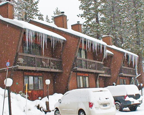 Snow covered Club Tahoe resort and parking.