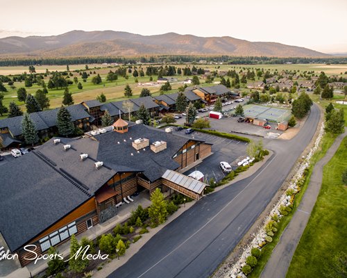 An aerial view of Stoneridge Resort with mountain and trees.
