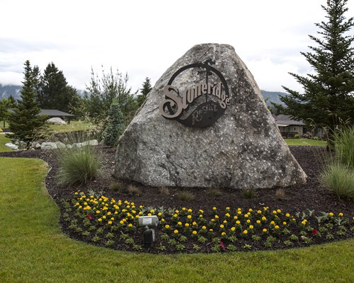 A rock with Stoneridge Resort's logo at the lawn.