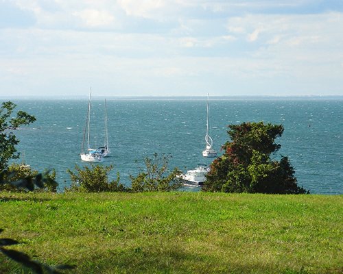 A scenic view with sail boats.