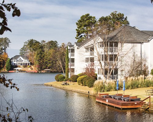 Multiple units surrounded by the lake.