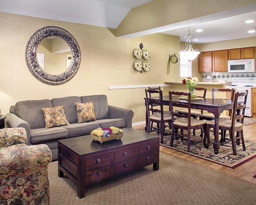 An open plan living room dining room and kitchen area.