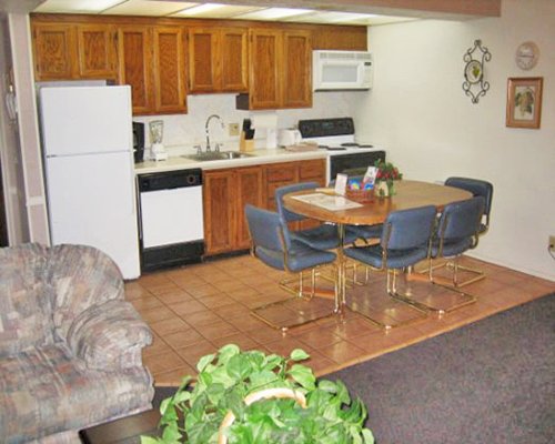 An open plan living dining and kitchen area.