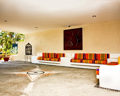 An outdoor lounge area with sofas.