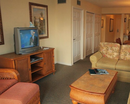 A well furnished living room with television.