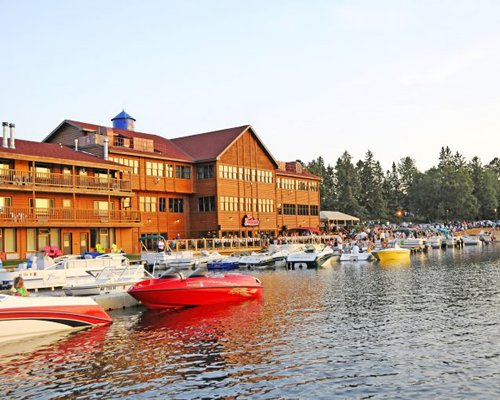 Lake view of Breezy Point Resort with boats.