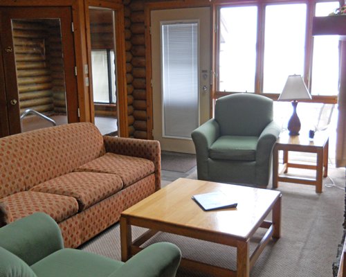 A well furnished living room with an outdoor view.