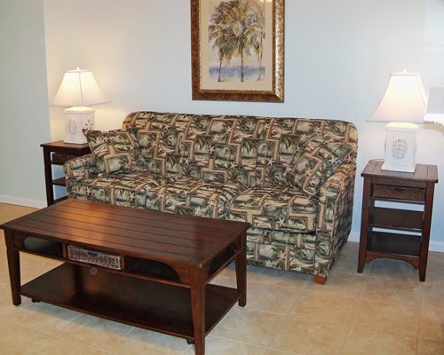 A well furnished living room with double pull out sofa.