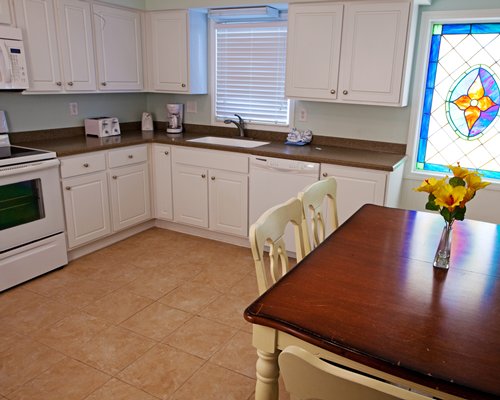 A well equipped kitchen with dining.