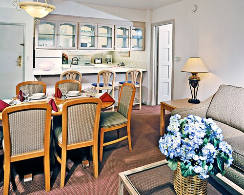 An open plan living dining and kitchen area.