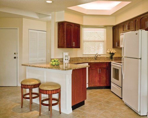 A kitchen with breakfast bar.