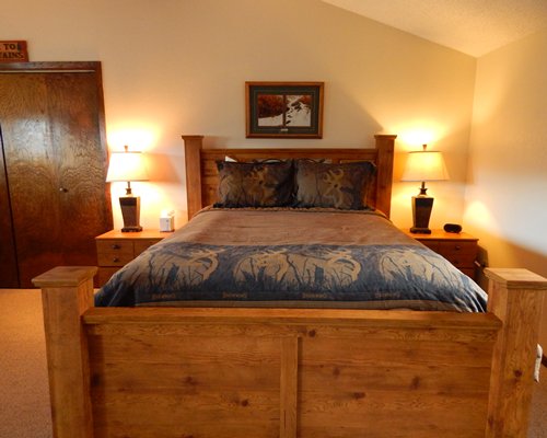 A furnished bedroom with two beds.