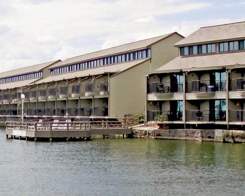 A lake view of multi story suites.