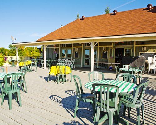 An outdoor restaurant area alongside a resort unit.