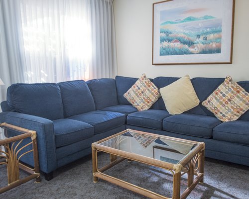 A well furnished living room with queen pullout sofa.