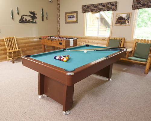 An indoor recreation area with a pool table.
