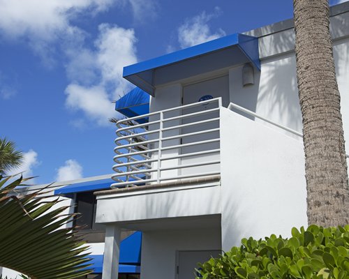A street view of a multi story resort unit.