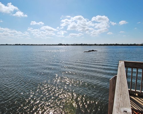 View of the water from a wooden pier.