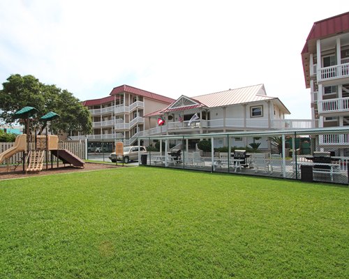 Scenic view of units at Tybrisa at the Beach with kids play area and car parking.