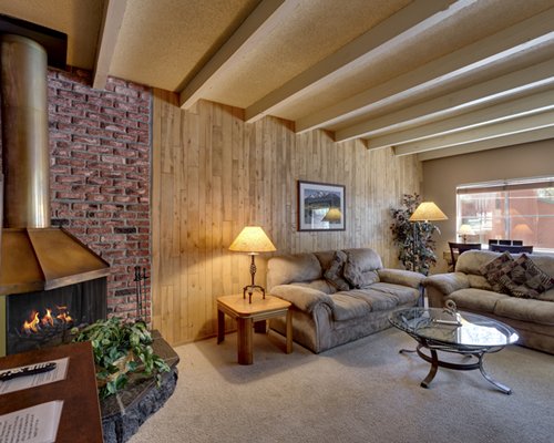 An open plan living room with two sofas.