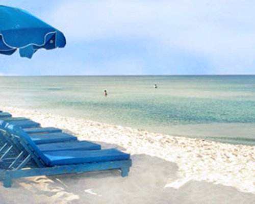 Chaise lounge chairs on the beach.
