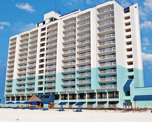 A beach view of Landmark Holiday Beach Resort.