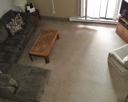 A well furnished bedroom with a queen bed.