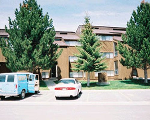 Exterior view of The Resort at Bear Lake with parking lot.