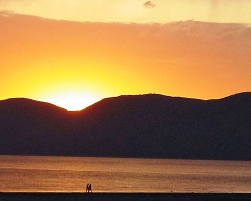Dusk view of the lake and the mountains.